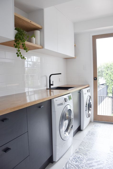 Custom laundry / utility room designed and built by RAW Sunshine Coast. Features solid American White Oak timber bench top and floating shelves. Matte black basin mixer and basin, textured white overhead cabinets and charcoal grey lower cabinets ... laundry goals, interior design, interior styling, moroccan tiles, scandi interiors, Scandinavian, natural, nature, wood grain, minimalist, modern, subway tiles, washing room Utility Room Designs, Scandi Interiors, Farmhouse Laundry, Laundry Design, Modern Room Decor, Modern Laundry Rooms, Farmhouse Laundry Room, Laundry Room Cabinets, Laundry Room Inspiration