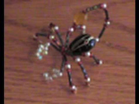 Here's a demonstration of how to make a scorpion from beads and wire. This is very similar to my beaded spider but I recommend trying to make the spider first at this is a little more advanced. Be sure to check out my other tutorials and subscribe!    http://www.AlternativeDreams.com/ 3d Beaded Animals, Beaded Scorpion, Spider Tutorial, Halloween Jewelry Diy, Wire Spider, Seed Bead Crafts, Macrame Bracelet Patterns, Beaded Spiders, Seed Beading