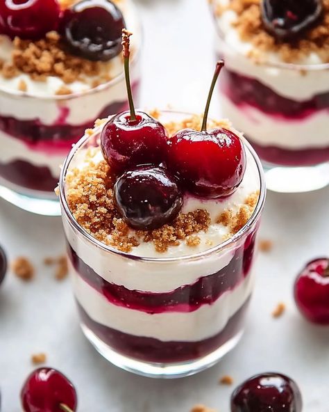 No-Bake Cherry Cheesecake Parfaits 🍒🧁 These cherry cheesecake parfaits are a delightful, easy-to-make dessert that's perfect for any occasion, especially during the holidays. With their creamy texture and sweet-tart cherry topping, they make a stunning and delicious treat! • Ingredients: • 6 pieces graham crackers (1 small individual pack), crushed • 8 oz. cream cheese, softened • ¼ cup organic sugar • 2 cups (40%) heavy whipping cream • 1 can (21 oz.) cherry pie filling • Canned cherries wit... Cheesecake Parfait Cups, Cherry Parfait, No Bake Cherry Cheesecake, Cherry Topping, Cheesecake Parfaits, Parfait Cups, Fit Foods, Canned Cherries, Cherry Desserts