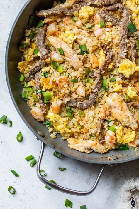 House Special Fried Rice is the perfect one-pot dish– made with a combo of frozen brown rice and cauliflower rice and loaded with chicken, shrimp, steak, and eggs for mega protein. #friedrice #protein #onepot House Special Fried Rice Recipe, Combination Fried Rice, Special Fried Rice Recipe, Vegetarian Asian, Special Fried Rice, Chicken Shrimp, Sauce For Rice, Cauliflower Fried Rice, Rice Ingredients