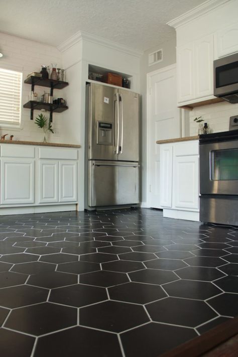 Black Hexagon Tile, Kitchen Floor DIY, DIY fridge surround, white cabinets, floating shelf, matte black floor, cabinet uppers Kitchen Floor Diy, Black Hexagon Tile Kitchen, Hexagon Tile Kitchen Floor, Diy Fridge Surround, Fridge Surround, Hexagon Tile Kitchen, Black Tiles Kitchen, Kitchen Floor Tile Design, Diy Kitchen Flooring