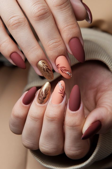 Embrace the beauty of autumn with stunning almond-shaped nails adorned in warm, earthy tones. These fall nail ideas feature rich burgundies, golden bronzes, and deep greens that perfectly capture the essence of the season. Elevate your style with intricate leaf designs or shimmering gold accents for a touch of elegance. Get inspired and create your unique autumnal manicure! #FallNailIdeas #AlmondNails #AutumnNails #NailArt #AutumnVibes Fall Almond Shaped Nails, Autumn Almond Nails, Fall Nails Ideas Autumn, Nails Ideas Autumn, Fall Nails Ideas, Fall Nail Ideas, Thanksgiving Nail Art, Thanksgiving Nail, November Nails