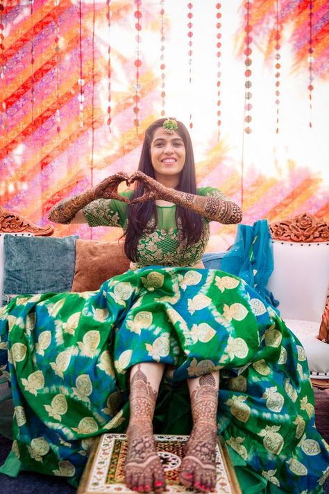 A Stunning Bangalore Wedding With A Bride In Gorgeous Kanjeevaram | WedMeGood Mehendi Looks For Bride, Mehndi Poses, Mehendi Photoshoot, Mehndi Photography, Mehendi Photography, Bangalore Wedding, Mehendi Function, Bridesmaid Poses, Mehndi Outfit