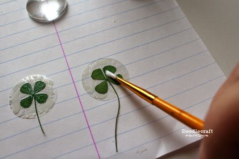 Fake 4-Leaf Clover Shamrock Pendant using mod-podge and painted it on the scrapbook paper Clover Craft, Shamrock Art, Clover Gifts, Clover Jewelry, 4 Leaf Clover, 4 Leaves, Irish Traditions, Luck Charms, What To Make