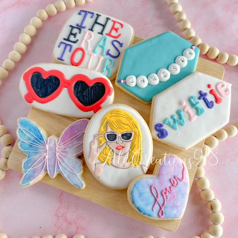 Taylor Swift cookies Pricing? 👉🏻 https://msha.ke/alecreations918 • • • • #alecreations918 #tulsasmallbuisness #tulsaoklahoma #decoratedsugarcookies #customcookies #cookie #cookies #inspirationcookies #cookiesofinstagram #desserts #dessertporn #dessertideas #partyideas #party #sugarcookies #royalicing #royalicingcookies #cookies #cookiesideas #royalicingideas #firstbirthday #taylorswiftparty #taylorswiftpartyideas #firstbirthdayideas #taylorswiftcookies #desserttable #taylorswift #swiftie #... Taylor Swift Butterfly, Baby Rattle Cookies, Rattle Cookies, Taylor Swift Cookies, Nice Cakes, Swift Party, Taylor Swift Party, Tulsa Oklahoma, Fun Cookies