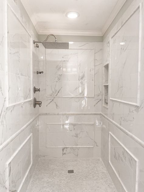 Marble tile Marble Shower With Chair Rail, Bathroom Marble Herringbone Floor, Shower With Chair Rail Tile, Marble Chair Rail Bathroom, Herringbone Master Bath, Classic Marble Bathroom, Herringbone Floor Bathroom, Herringbone Shower Floor, Herringbone Bathroom Floor