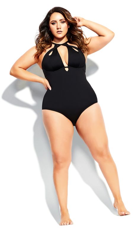 Fit, flatter, and love your curves in the striking and supportive fit of the Cancun Underwire 1 Piece. Key Features Include: - Intertwined neck strap feature - Adjustable shoulder straps - Padded underwire bust support - Power mesh lining - Back buckle closure - Full brief Style with cat-eye sunglasses for added glamour! | Plus Size Cancun Uw One Piece Brief In Black | Size 14 | Avenue Summer Style Guide, Plus Size One Piece, Plus Size Swim, Black Swimwear, Plus Size Lingerie, Plus Size Swimwear, Neck Strap, Swimwear Fashion, City Chic