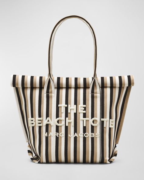 Marc Jacobs beach tote bag in striped canvas cotton    Shoulder straps     Foldover flap top     Exterior, beach towel slot (towel not included)    Interior, one zip pocket and one slip pocket     Approx. 19.5"H x 19.3"W x 0.2"D    Imported Karl Lagerfeld Bag, Rich Mom, Herringbone Texture, Marc Jacobs Tote, Beach Tote Bag, American Fashion Designers, Bags Logo, Beach Tote Bags, Beach Tote