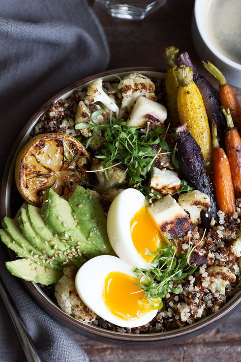 grain bowl with quinoa, soft-boiled egg, roasted carrots and cauliflower recipe from Cooking with Cocktail Rings Breakfast Grain Bowl, Halloumi Cheese, Grain Bowl, Soft Boiled Eggs, Low Cholesterol, Toasted Sesame Seeds, Roasted Carrots, Farmer's Market, Breakfast Bowls