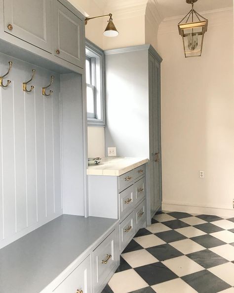 Mudroom off front entry. Love the tile, painted cabinetry, drawers for storage, close cabinets for vacuum cleaners, lockers for hanging, counter for mail, keys. Laundry Mudroom, Entry Storage, Laundry Room/mud Room, Caitlin Wilson, Mudroom Design, Laundry Room Remodel, Black And White Tiles, Iphone Photo, Laundry Mud Room