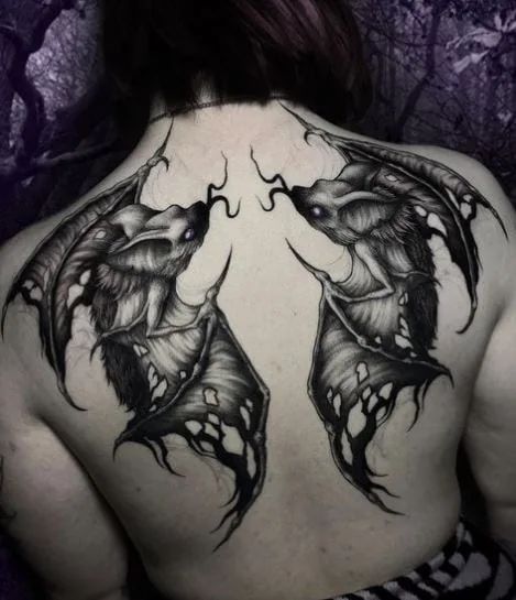 110 Gothic Tattoo Ideas To Bring Out Your Darker Side Dark Gothic Sleeve Tattoo, Gothic Inner Arm Tattoo, Creepy Back Tattoos, Spooky Spine Tattoo, Goth Wings Tattoo, Gothic Back Tattoos For Women, Back Tattoo Goth, Bat Wings Back Tattoo, Gothic Sleeve Tattoos For Women