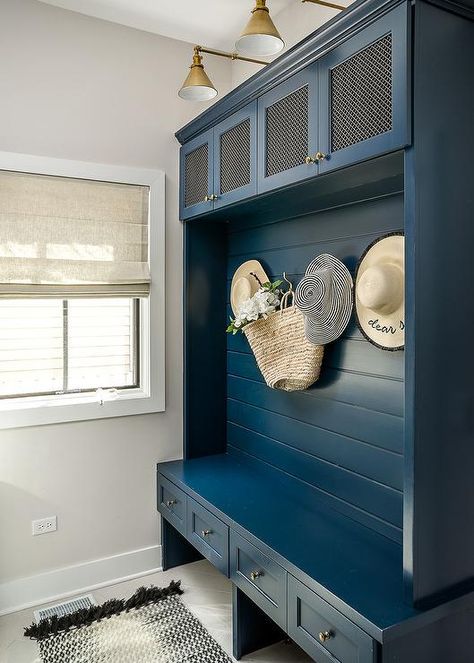 Blue built-in mudroom wall displays shiplap trim over a bench with lower storage drawers accented by brass hardware. Mudroom Remodel, Farmhouse Mudroom, Painted Interior Doors, Open Floor Concept, Farmhouse Fireplace, Bench Designs, Mudroom Bench, Modern Farmhouse Kitchens, Farmhouse Style House