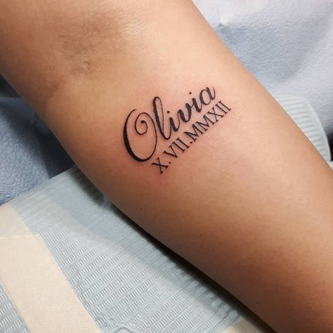 This client got sweet script of her daughter's name and birth date💗Done with a light touch by @stephanie.tattoos #momlifebelike… Roman Name Tattoo, Birthdate Tattoo, Name Tattoos For Moms, Numeral Tattoo, Baby Name Tattoos, Tatuagem Masculina Pequena, Roman Numeral Tattoos, Date Tattoos, Mommy Tattoos