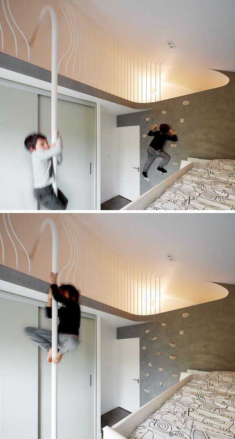 In this kids bedroom, a rock climbing wall lets the children climb up to a lofted area where they can slide down a pole to get down. Mezzanine Design, Mezzanine Bedroom, Room Girl, Secret Space, British Home, Rock Climbing Wall, Kids Bedroom Sets, Climbing Wall, Split Level