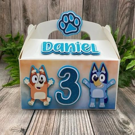 Blue Dog Treat Boxes, Blue Dog Favor Boxes  This boxes are perfect for your party decoration and the perfect little gift for your guests! The boxes come fully decorated and ship flat to prevent any damage while shipping. Size L: 6.25" x 3.5" x 3.5" Copyright Notice* This product cannot be used commercially but is for personal use only. Any licensed images within this listing are free and not being sold; they maintain the copyright of their original respective owners. Purchase price is for my tim Bluey Birthday Party Favors, Bluey Birthday Ideas, Fiesta Bluey, Halloween Pinata, Bluey Party, Bluey Birthday, 2 Birthday, Valentines Gifts For Him, Dog Treat