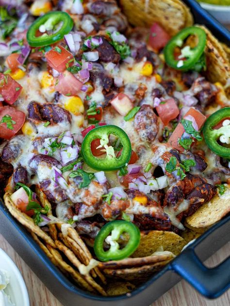 Loaded Veggie Nachos Loaded Nachos Recipe, Veggie Nachos, Vegetarian Nachos, Loaded Nachos, Nachos Recipe, Mashed Avocado, Corn Chips, Quesadillas, Tomato Paste