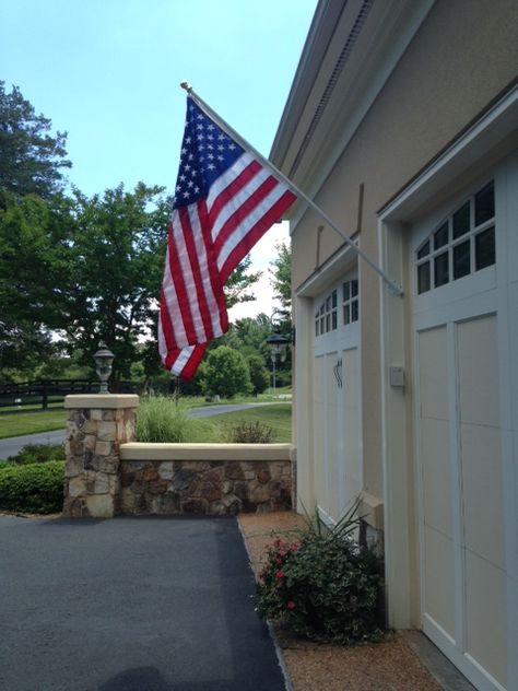 American Flag Outdoor Decor, American Flag Pole Landscaping, Flag In Front Of House, American Flag On House Exterior, Flag Pole Ideas, American Flag On House, Flag On Porch, Flag On House, Flag Pole Landscaping