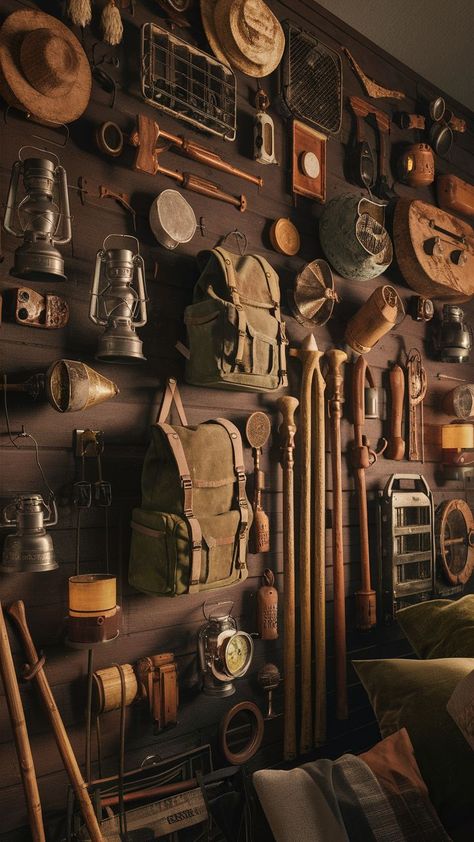 A vintage-inspired room with an antique camping gear wall, displaying outdoor gear in an organized manner. Camping Gear Aesthetic, Camping Gear Wall, Organized Camping, Vintage Large Capacity Outdoor Bag, 1920s Camping, Vintage Coleman Camping Gear, Outdoor Gear Storage, Vintage Camping Gear, Vintage Waxed Canvas Outdoor Bag