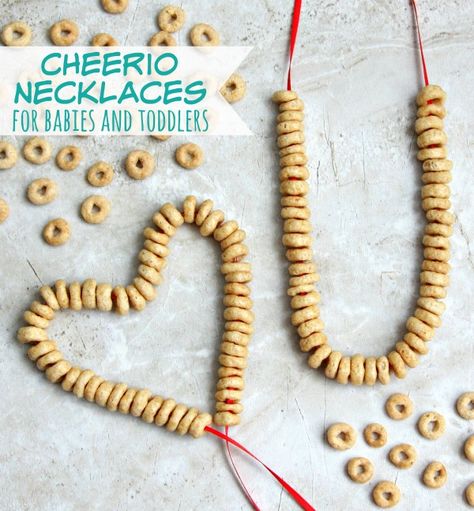 cheerio-necklaces-for-babies-and-toddlers Cheerio Activities, Cheerios Necklace, Cheerio Necklace, Winter Crafts For Toddlers, Games For Kids Classroom, Indoor Games For Kids, Toddler Winter, Handprint Crafts, Preschool At Home