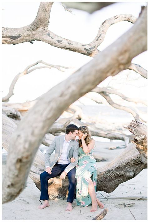 Romantic Sunset Beach Engagement photo poses and ideas. What to wear for formal beach engagement photos: grey suit and long floral dress. Unique photo location. Driftwood Beach Sunset Engagement Photos in Jekyll Island, Georgia. Light and airy photography editing style. Shauna and Jordon Photography. Driftwood Beach Jekyll Island, Romantic Sunset Beach, Fall Maternity Pictures, Jekyll Island Georgia, Engagement Picture Outfits, Driftwood Beach, Family Beach Pictures, Sunset Session, Jekyll Island