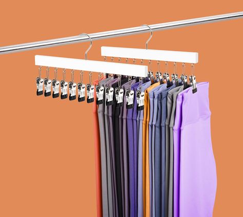 PRICES MAY VARY. 【 Organize 24 Leggings 】Each legging hanger includes 12 clips, comes 2 pack hangers can effortlessly organize and store up to 24 leggings. The dimensions of 15"L x 0.47"W x 7.8"H make it save 80% of your closet space. 【 Multifunctiaonl Hanger 】These closet hangers are not only for leggings, but also perfect for hanging jeans, yoga pants, tights, skirts, shorts, ties, scarves, etc. This versatility adds value to the closet organizer and makes it a great addition to any wardrobe. Active Wear Storage, Tights Storage Ideas, Legging Organization Ideas Closet, Hang Shorts In Closet, Hanging Leggings In Closet, Workout Clothes Organization Ideas, How To Store Leggings In Closet, How To Store Shorts In Closet, Organize Leggings Closet