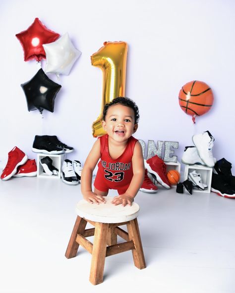 It’s time to celebrate! This little baller’s first birthday photoshoot was a slam dunk! From the gorgeous smiles to the awesome basketball outfit, he’s ready to take on the world! ‌ #firstbirthday #birthdayboy #babyboy #smiles #gorgeous #baller #ballerbaby #ballerstatus #basketball #basketballoutfit #picturemomentsphotography 1st Pictures Birthday Photo Ideas, 1st Bday Basketball Theme, Rookie Year First Birthday Basketball, 1 Birthday Photoshoot, Baby Boy Basketball, Basketball Themed Birthday Party, Basketball Theme Birthday, Basketball Outfit, First Birthday Photoshoot