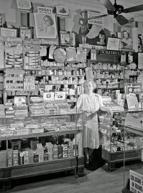 mrs. ethel oxley, in the drugstore which she runs on southington, connecticut's main street | may 1942 | #vintage #1940s #connecticut Southington Connecticut, Old General Stores, Vintage Grocery, Incredible Pictures, Country Stores, West Side Story, Soda Fountain, My Childhood Memories, Grocery Stores