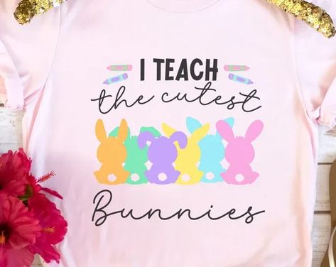 Easter teacher shirts for school this cute design will have everyone smiling. visit shop for more Easter Teacher Shirts, Shirts For School, Kindergarten Easter, Cutest Bunnies, Easter Kindergarten, Fun Tshirt, Easter Shirts, Holiday Hoodies, Easter T Shirts