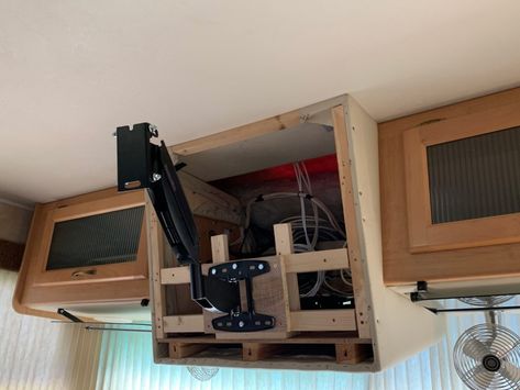 Are You Not Entertained? Upgrading our RV TV - Seeking Sights Rv Tv Cabinet Remodel, Rv Tv Mounting Ideas, Rv Tv Mount, Travel Trailer Hacks, Rv Tv, Rv Cabinets, Tv Placement, Rv Upgrades, Rv Renovation