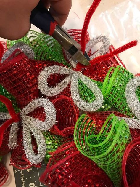 Create a gorgeous christmas wreath on a serious budget with this fabulous in depth tutorial. Your Christmas wreath will be one for the books. #diy #christmas #diychristmas #wreath #jesus #diywreath #wreathtutorial Real Christmas Wreaths, Lego Christmas Ornaments, Christmas Deco Mesh Wreath, Diy Deco Mesh Wreath, Christmas Deco Mesh, Deco Mesh Crafts, Deco Mesh Wreaths Tutorials, Deco Mesh Wreaths Diy, Christmas Front Door