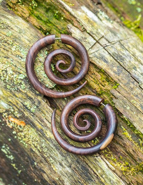 # High Quality Carved Wood # Robust # For Regular Pierced Earrings # Sold as Pair Faux Gauges More payment options This Super Spiral Fake Gauge is a large size earring that looks like a 12mm gauge expander. It is a WONDERFUL piece, totally reminiscent of the tribal style, authentic and irreverent! It allies with the energy of the wild woman archetype who lives within us and is the representation of ancestry in a jewelry. If this is for you, take the opportunity today to take it home, because our Spiral Septum, Wild Woman Archetype, Spiral Gauges, Nose Peircing, Faux Gauges, Fake Gauge Earrings, Fake Gauges, Gauged Earrings, Wild Woman