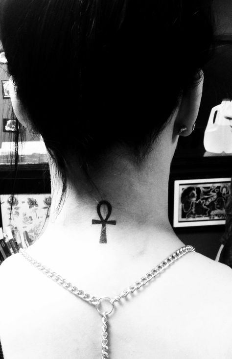 My first tattoo. An Ankh. It's an Ancient Egyptian symbol meaning eternal life. The gods pressed them to the lips of the worthy for the breath they would need in the after life. Eternal Life Tattoo, Life Symbol Tattoo, Back Of Neck Tattoos For Women, Buddhist Tattoos, Playboy Tattoo, Watermelon Tattoo, Nefertiti Tattoo, Ankh Tattoo, Buddhist Tattoo