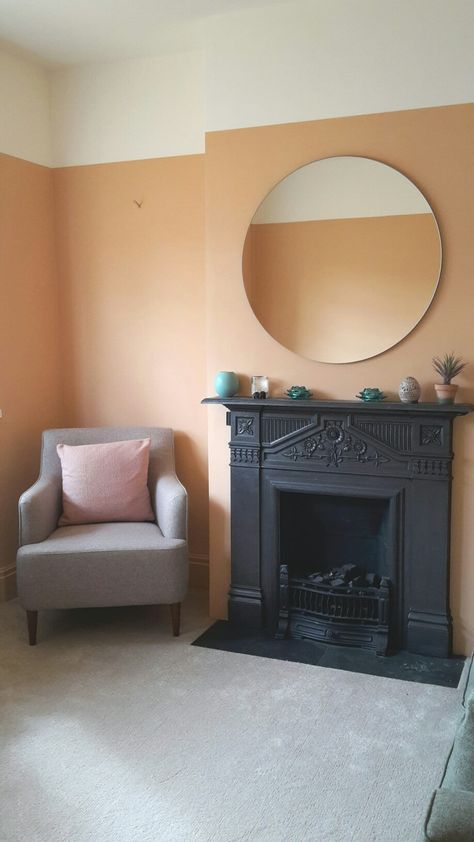 Dulux Sunbaked Terracotta and Desert White. Next Carter armchair. Round Scandi mirror from John Lewis over mantle. Half Orange Wall, Sunbaked Terracotta Dulux Paint, Scandi Mirror, Terracotta Hallway, Orange Accent Walls, Kitchen Feature Wall, Over Mantle, Bedroom 2023, Best Wall Colors