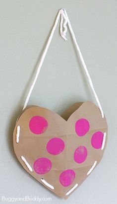 Heart Valentine Holder made from a brown paper grocery bag February Arts And Crafts, Valentines Card Holder, Preschool Valentine Crafts, Fine Motor Practice, Valentine Art Projects, Paper Grocery Bags, February Crafts, Valentine's Day Crafts For Kids, Preschool Valentines