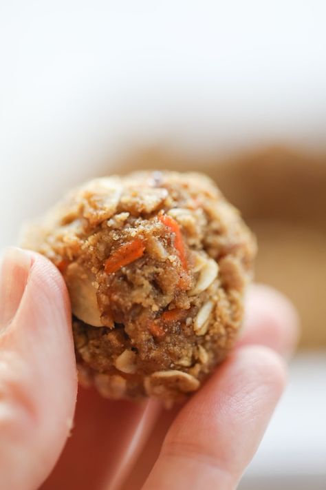 protein bite in hand Carrot Cake Protein, Carrot Cake Balls, Oatmeal Bites, Cookie Dough To Eat, Low Calorie Protein, Afternoon Slump, Carrot Cake Oatmeal, Healthy Carrot Cakes, Peanut Butter Roll