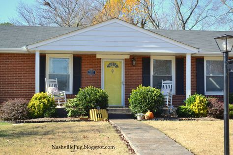 Yellow door on a brick ranch!  Paint color is Goldenrod by Glidden Yellow Shutters Brick House, 1970s Ranch House Exterior, Navy Shutters, Painted Brick Ranch, Paint Brick, Brick Ranch Houses, Brick Bungalow, Red Doors, Yellow Front Doors