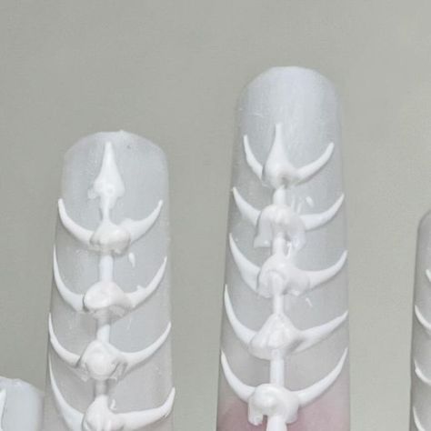 Rachel on Instagram: "3D fish bone   Remember when you learned how to pick out fish bones? I’ve saved them for you and put them on your nails 🦴   #3dnailart #bonenails #lanailtech" 3d Bone Nails, Tooth Nails Design, Fish Nail Art Designs, Anatomy Nails, Bone Nail Art, Bones Nails, Bone Nails, Fish Nail Art, Fish Nails