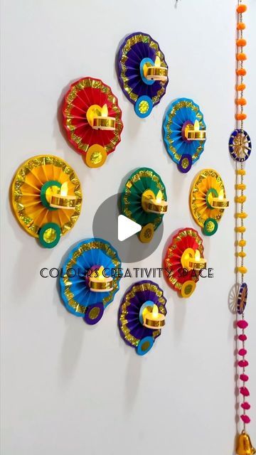 Colours Creativity Space on Instagram: "Diwali Decoration Ideas 2024 🪔 Diwali Tealight Wall Decor Idea / Deepdwar DIY 
Easy Diwali Paper craft idea 
Diya wall decor/ holder from paper 
Diwali Decor Diya 
Diwali Wall Art Decoration 
🌸 Paper size 6 x 40 cm 
🌸Use Masking tape to hang paper Diya flower on wall 

#diwalidecorations #diwali #jharokha #papercrafts #paperflowers #diwalidiya #backgrounddecoration #festivaldecor #lighting #kidscraft #schoolcraft #diwalivibes✨ #trending #diwalidecor #diwalidecorationideas #deepdwar #paperdiya #craftreels #diya #lighting #viralreels #" Diwali Paper Craft, Paper Diya, Diya Diwali, Diwali Decoration Ideas, Diwali Lights, Diwali Diya, Diwali Decor, Diwali Decoration, Background Decoration