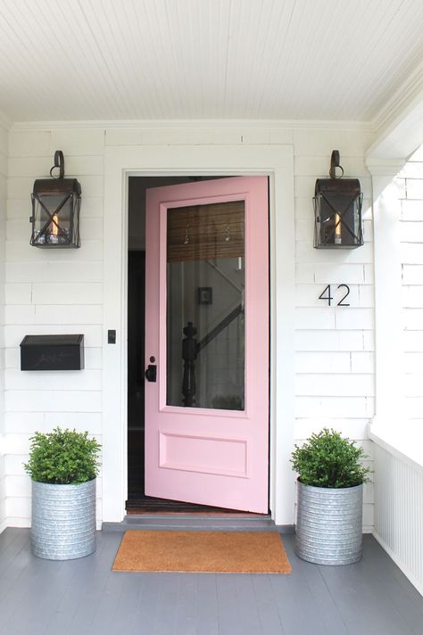 We painted our door pink and it looks like Spring has arrived with new planters of boxwoods! Plus we love our new Emtek door hardware. Pink Front Door, Spring Porch Decor, Salon Suites, Pink Door, Small Front Porches, Front Door Colors, House With Porch, Front Porch Decorating, Pink Houses