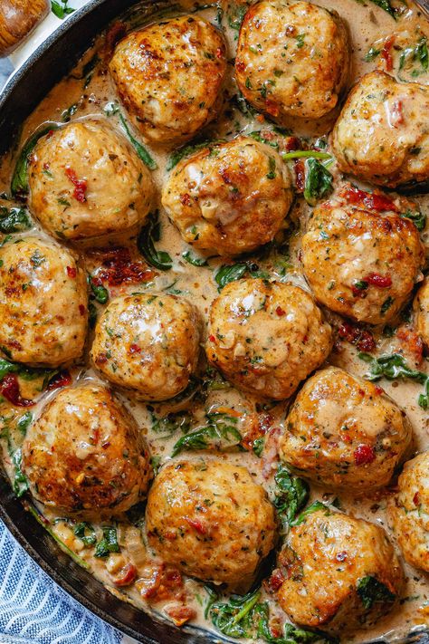 Creamy Spinach Turkey Meatballs Recipe - #turkey #chicken #meatballs #recipe #eatwell101 - These turkey meatballs are Gluten-free, low-carb, and keto-friendly - Perfect for a crowd-pleasing weeknight dinner. - #recipe by #eatwell101® Spinach And Meatballs, Turkey Meatballs With Oats, Turkey Feta Meatballs And Lemon Crema, Turkey Meatballs Sides, Chicken Sausage Meatballs, Cajun Turkey Meatballs, Tuscan Turkey Meatballs, Ground Turkey And Pork Recipes, Turkey Meatball Orzo