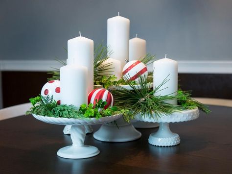 Proof that cake stands can go beyond the kitchen. Transitional Christmas, Picture Wedding Centerpieces, Simple Arrangements, Christmas Dollhouse, Chirstmas Decor, Christmas Decorations Apartment, Apartment Christmas, White Pillar Candles, Holiday Graphics