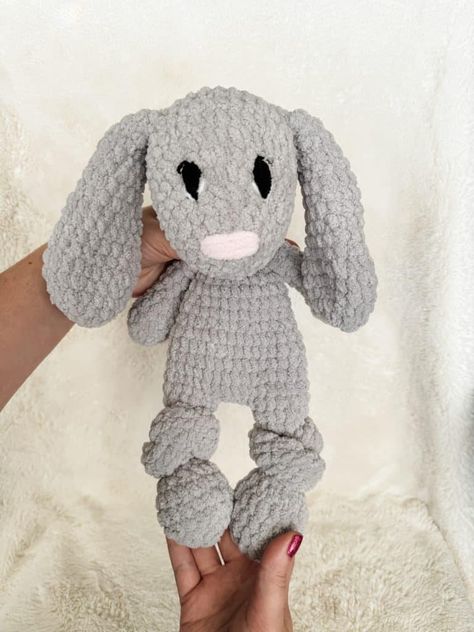 This is a free crochet snuggler pattern of the cuddly classic bunny! Half stuffed animal, half blanket but twice the fun! This crochet bunny lovey would be a great crocheted nursery gift! Embroidered eyes and blanket yarn make it more baby friendly. Bunny Snuggler Crochet Pattern, Crochet Baby Snuggler Free Pattern, Crochet Bunny Snuggler, Amigurumi Snuggler, Crochet Snuggler Pattern, Crochet Bunny Lovey, Snuggler Pattern, Crochet Teddy Bear Pattern Free, Crochet Snuggler