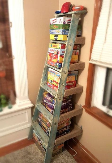 Repurposed Ladder Shelf, Interior Design Country, Repurposed Ladders, Ladder Shelf Diy, Board Game Storage, Hangout Room, Old Ladder, Game Room Family, Games Design