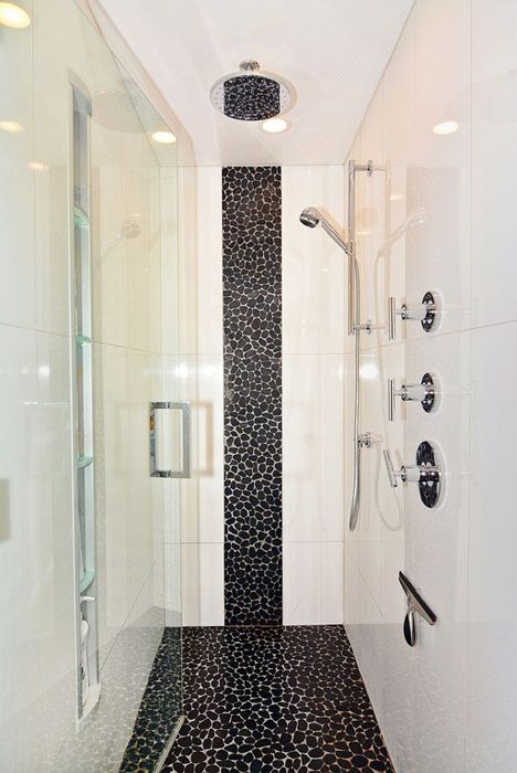 Rainfall shower with black pebble floor and wall tile Black Shower Floor, Pebble Shower Floor Dark Grout, Black Pebble Shower Floor, Master Shower Pebble Floor, Black Pebble Tile Shower Floor, Black Pebble Shower Floor With Alaria Tiles, Black Pebble Tile, Black And Gray Pebble Shower Floor, Pebble Shower Floor