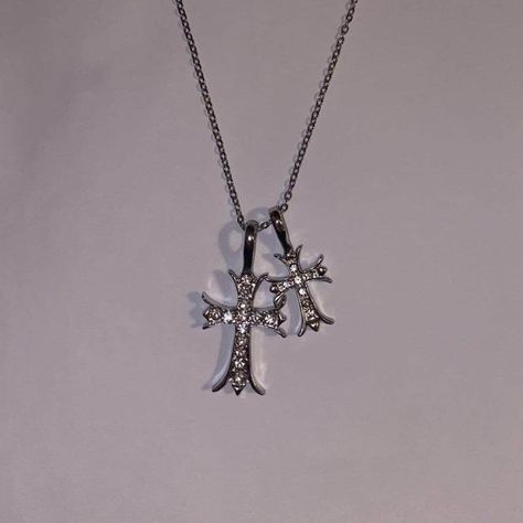 Stainless Steel Silver Baroque Double Cross Necklace ⋆｡‧₊o♱༺𓆩❦︎𓆪༻♱༉.   Each order comes w/ a gift ️   V cool piece, perfect 4 grungecore, cybergoth, cybery2k & whimsygoth outfits 🖤   18" stainless steel chain⛓️🗡️   Zircon embellished crosses ❤️🔥   Lobster claw closure    Handmade in NY   o Feel free to DM about any item Double Cross Necklace, Jewelry Cross Necklace, Cross Jewelry Necklace, Goth Necklace, Crystal Cross, Cross Chain, Silver Jewelry Necklace, Dope Jewelry, Silver Cross