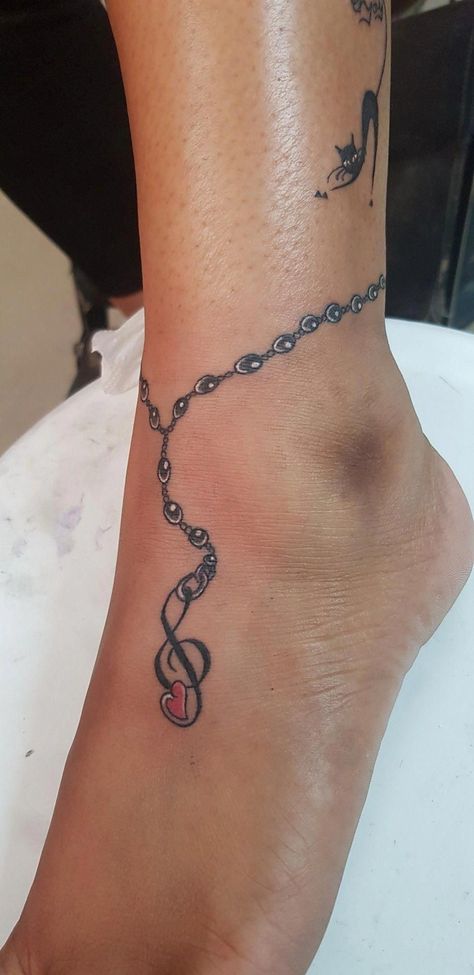 Ankle Tattoos For Women Anklet Ideas Charm Bracelets, Anklet Bracelet Tattoo, Ankle Charm Bracelet Tattoo, Anklet Tattoos For Women Chains, Anklet Tattoos For Women Unique, Chain Tattoos For Women, Anklet Tattoos Wrap Around, Ankle Chain Tattoo, Ankle Tattoos For Women Anklet