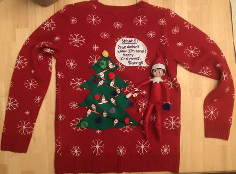 Our elf on the shelf is joining me for ugly sweater day on the back of my shirt! #elfontheshelf #elfontheshelfideas #elfideas #uglysweater Elf On The Shelf Ugly Sweater Diy, Elf On The Shelf Sweater, Ugly Sweater Ideas, Ugly Sweater Day, Sweater Diy, Elf On Shelf, Ugly Sweater Diy, Sweater Ideas, Ugly Christmas Sweaters