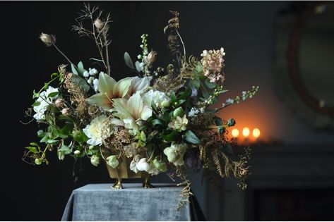 Antique brass bowl on feet filled with seasonal foliage and winter flowers including amaryllis and hellebores, £100, Simply By Arrangement. Charleston Christmas, Shades Of Violet, Flower School, Vintage Napkins, Creative Display, 2019 Calendar, Edible Gifts, Antique Vase, Winter Flowers