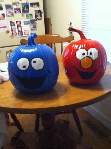 Cookie Monster and Elmo Halloween pumpkins! Woohoo! Finally finished. Not too shabby! Just some spray paint, and acrylics. Voila! Elmo Pumpkin Painted, Elmo Pumpkin, Cookie Monster Pumpkin, Pumpkin Designs Painted, Cute Painted Pumpkin Ideas, Halloween Pumpkin Crafts, Cute Pumpkin Carving, Elmo And Cookie Monster, Creative Pumpkin Painting