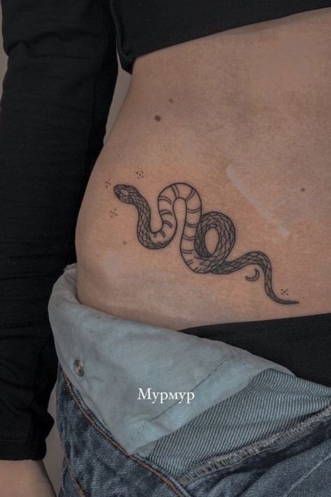 Snake tattoo design encircling the waist with artistic flair Snake Tattoo Ideas, Small Lotus Tattoo, Side Hip Tattoos, Rib Tattoos For Women, Waist Tattoos, Grunge Tattoo, Tatoo Inspiration, Medusa Tattoo, Dainty Tattoos